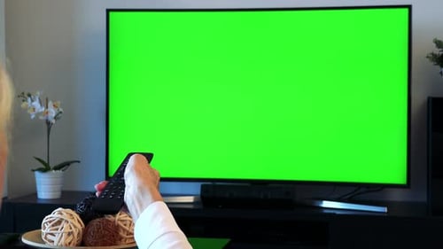 Woman Watching Green Screen Television