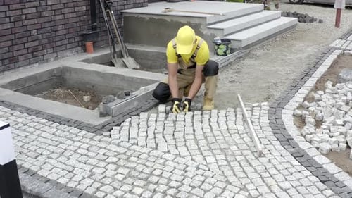 Worker Building Granite Paved Hardstanding Garden Path