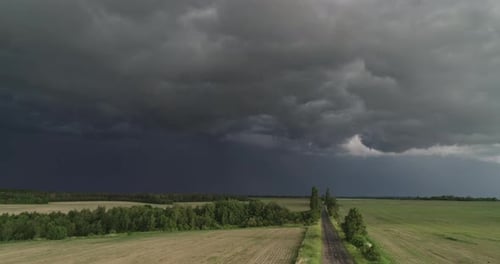 Aerial Dark Ominous Grey Storm Clouds. Dramatic Sky. Lighting In Dark Stormy Clouds