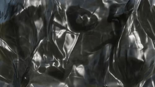 Dark Reflective Abstract Fluid Motion Background