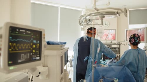 Medical Professionals Performing Surgery in Operating Room