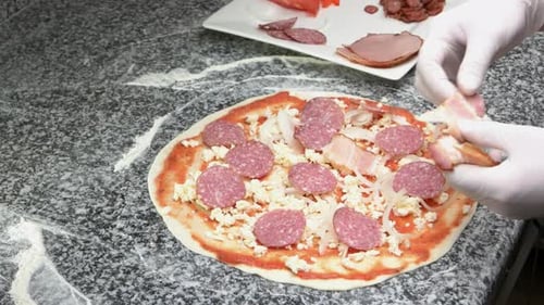 Hands Making Meat Pizza