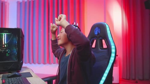 Young Adult Gaming and Celebrating Victory