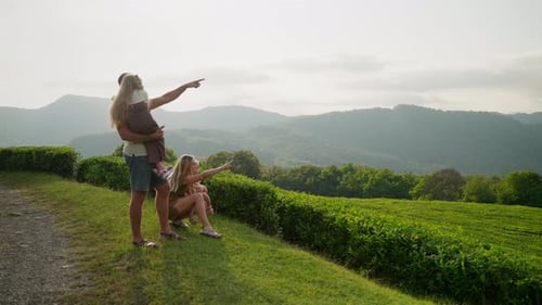 Family Enjoys the Countryside View on a Sunny Day