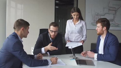 Creative Business Team Meeting in Modern Start Up Office.