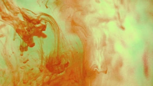 Orange and Yellow Paint Mixing in Water