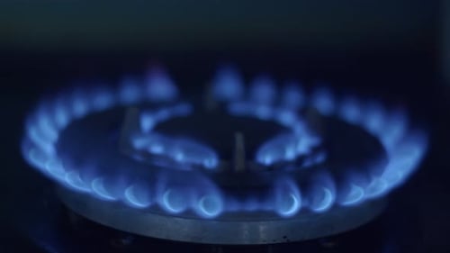 Glowing Blue Flame on Gas Stove Burner