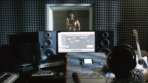 Black Woman Recording Song in Studio