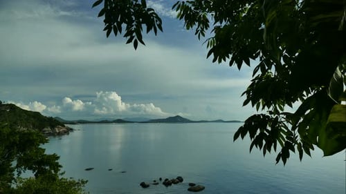 Beautiful tropical beach sea ocean with blue sky and white cloud