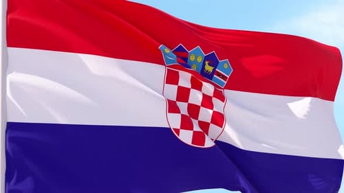 Realistic Waving Croatia Flag Against Blue Sky