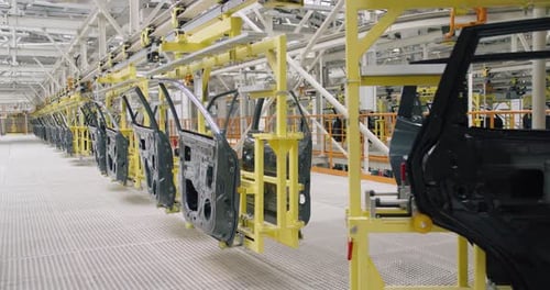 Automobile Plant, Modern Production of Cars, Transportation of Ready Car Doors on the Production