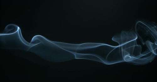 Abstract Blue Smoke Motion on Black Background