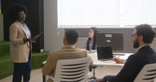 Business Meeting in Office Space