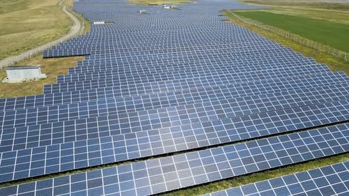 Aerial View of a Vast Solar Panel Farm