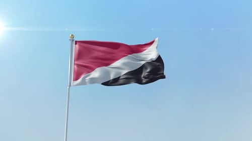 Realistic 3D Flag Waving in the Wind Against Blue Sky