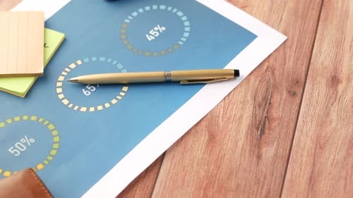 Financial Graph Calculator and Notepad on Table