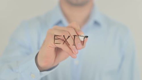 Writing Exit with Marker on Clear Surface