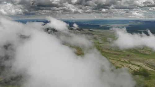 Green Hills and Low Clouds Aerial View