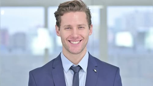 Smiling Young Adult Man in Business Suit