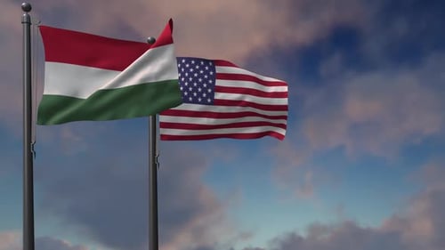 Hungary and United States Flags Waving in Wind