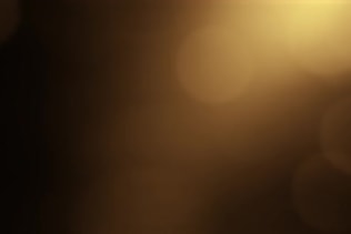Gold Yellow Bokeh Particles Background