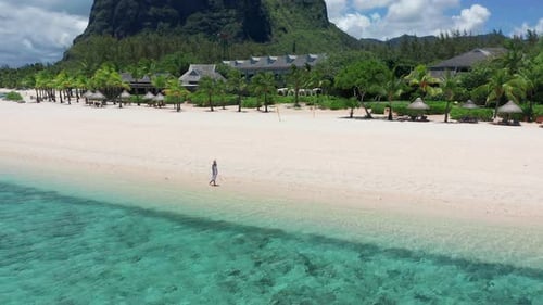 Girl Walking on a White Sand Beach on a Tropical Island in the Mauritius Indian Ocean
