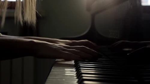 Woman Hands Finish Playing Classical Music on the Piano Close-up in Slow Motion