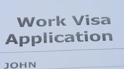 Approved Work Visa Application Document With Blue Stamp