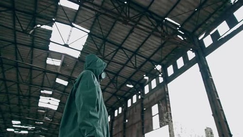 Person in Hazmat Suit in Derelict Building