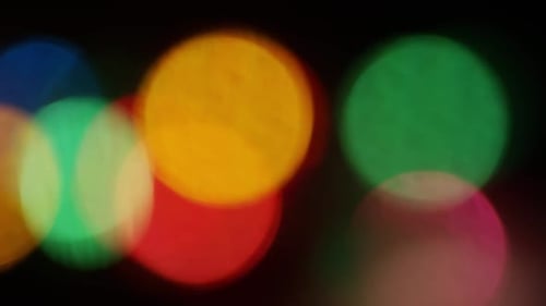 Abstract Bokeh Lights Shimmering in the Dark
