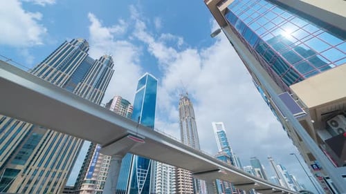 Time lapse of clouds. Pattern of office buildings windows. Glass architecture