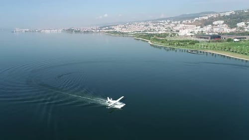Drone Image of a Seaplane Taking Off From The Sea