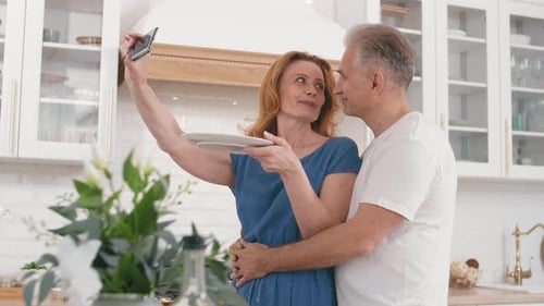 Loving Couple Taking Selfie in Bright Kitchen