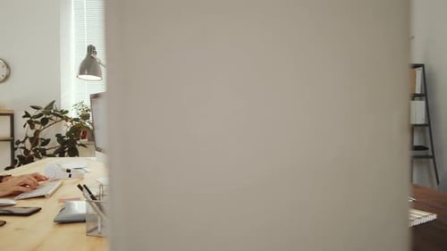 Teamwork in a Modern Workplace Office Setting