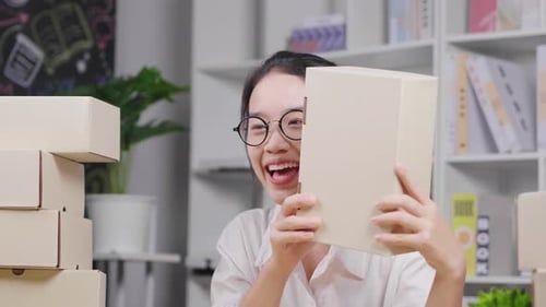 Woman Showing Package on Video Call