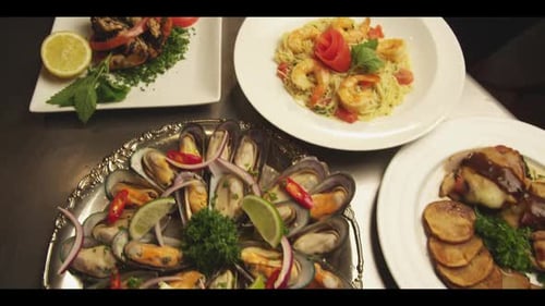 Overhead shot of delicious seafood restaurant dishes
