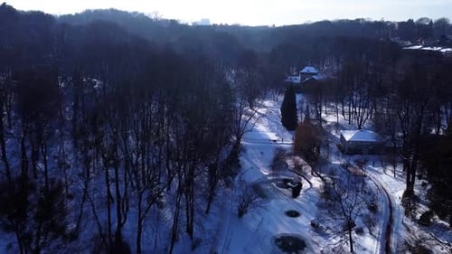 Aerial view of a drone flying over the winter park.