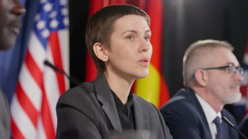 Political Panel Speaking at a Press Conference