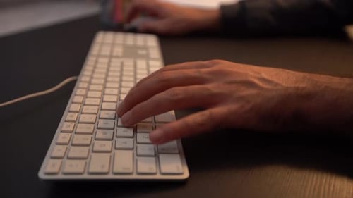 Close-up image of working on keyboard