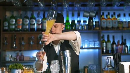 Bartender Making Cocktail in Professional Setting