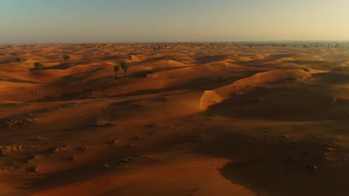 Aerial view of dunes creating shadows at a desert landscape, U.A.E.