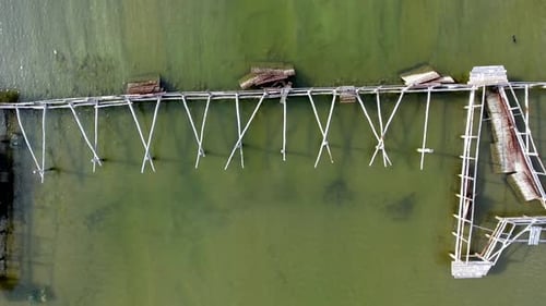 Aerial View of Wooden Structure in Shallow Water