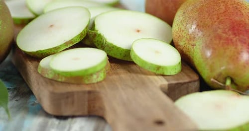 Round Slices of Ripe Pear Slowly Rotate.