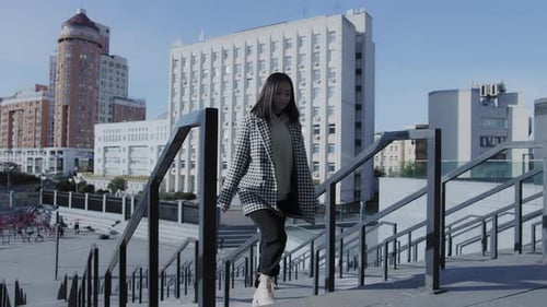Confident Walk of a Young Adult Asian Woman in the City Downtown