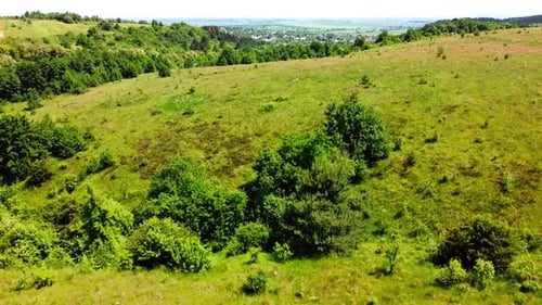 Aerial drone view of a flying over the rural agricultural landscape.
