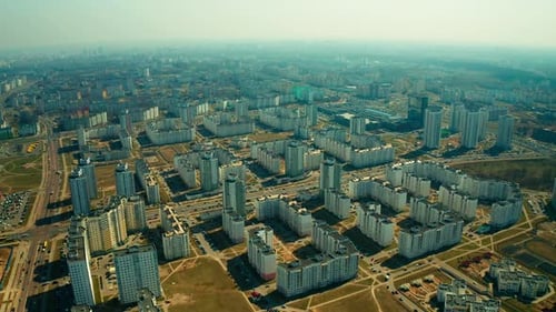 Top view of multi-storey building under construction in summer.