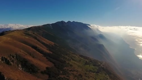 Mysterious Mountain Between Clouds