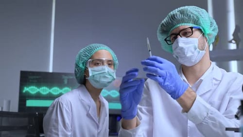 Scientists Preparing Injection in a Laboratory Setting