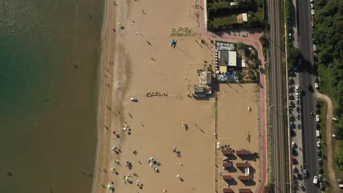 Top View, Drone Moving Above Summer Sea Coast, Perfect Public Golden Sandy Beach with Chairs