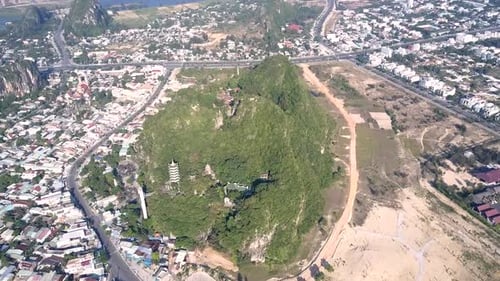 Panorama Hill with Ancient Temple Among Modern City